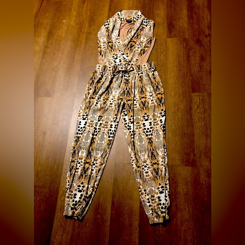 Bebe body suit and pant animal print